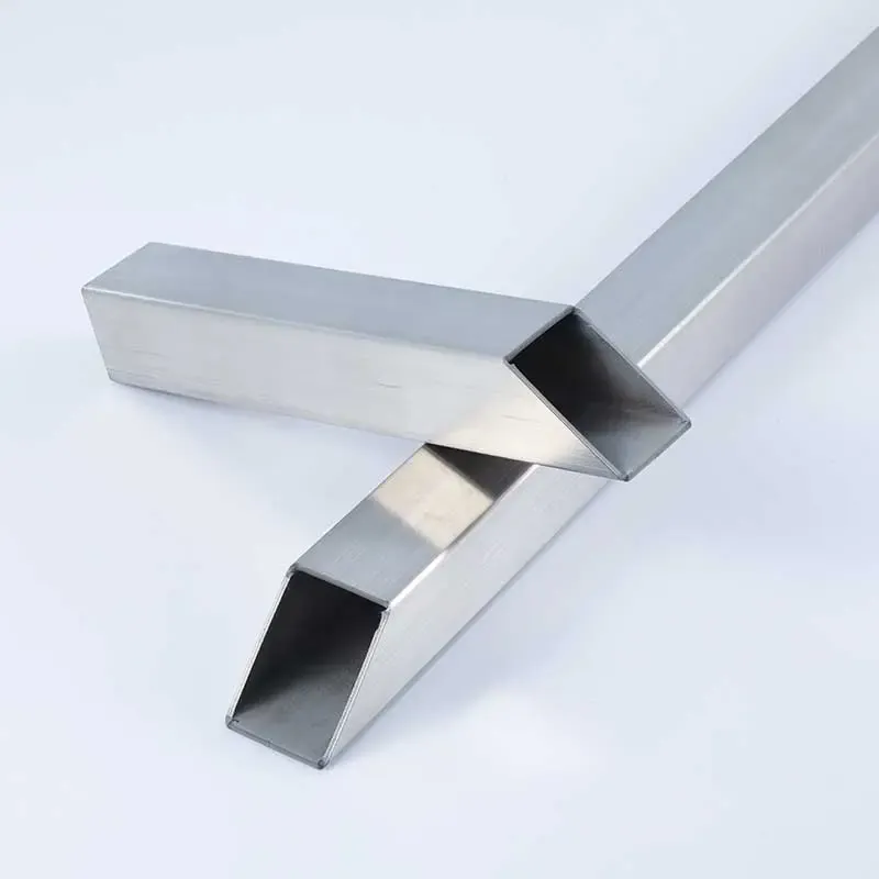 Rectangular stainless steel tubes arranged on a white background