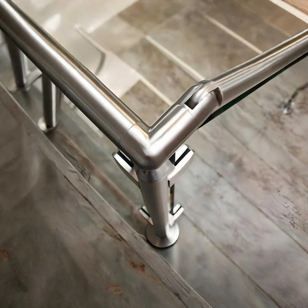 Stainless steel tube connection on a glass balustrade