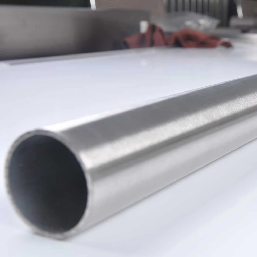 Close view of a satin stainless steel handrail tube end